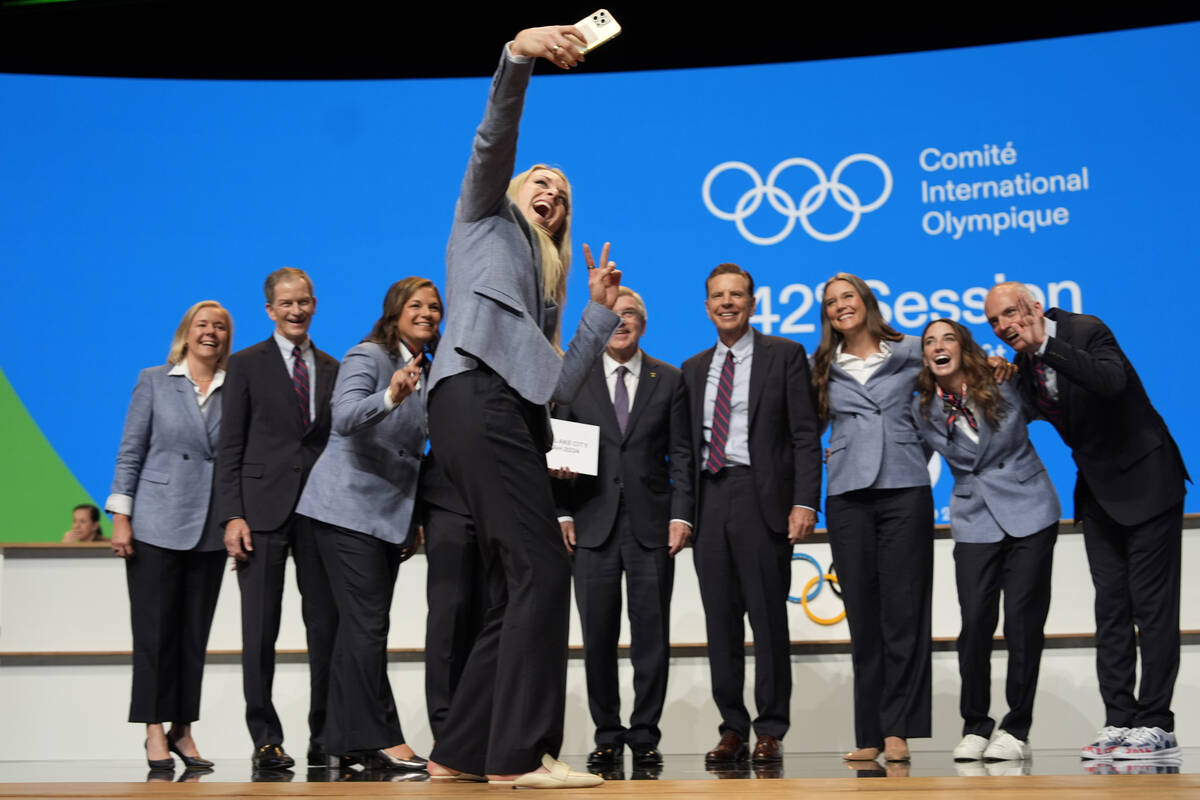 Former US skier Lindsey Vonn makes a selfie with the Salt Lake City delegation after Salt Lake ...