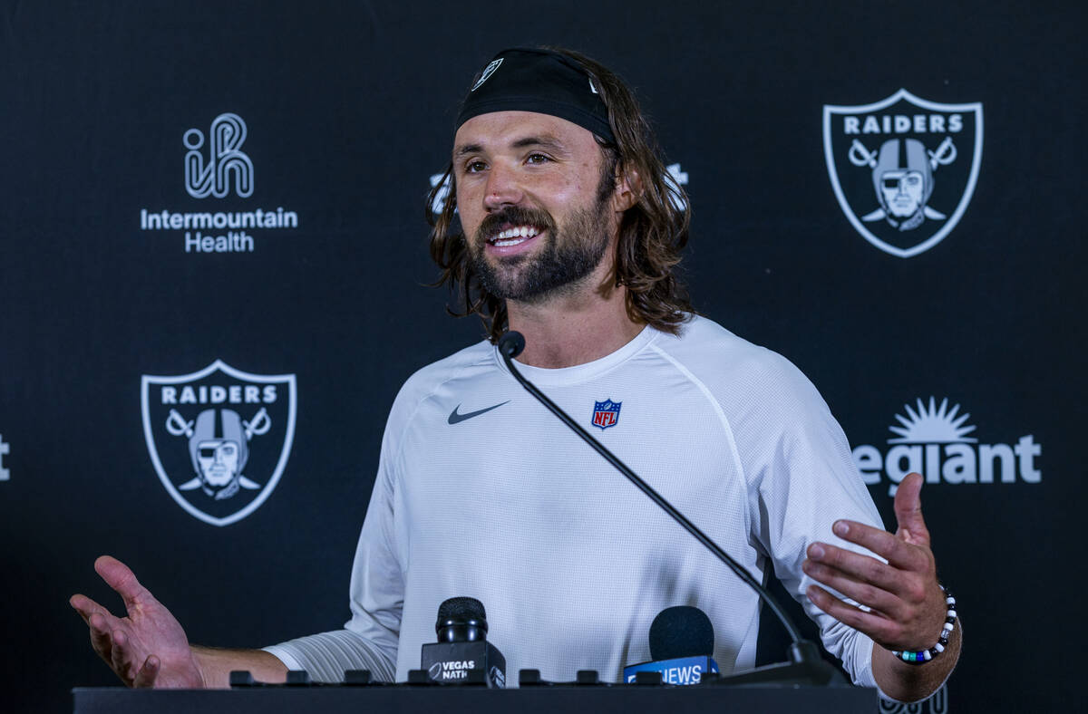 Raiders quarterback Gardner Minshew (15) responds to a question during a media interview on the ...