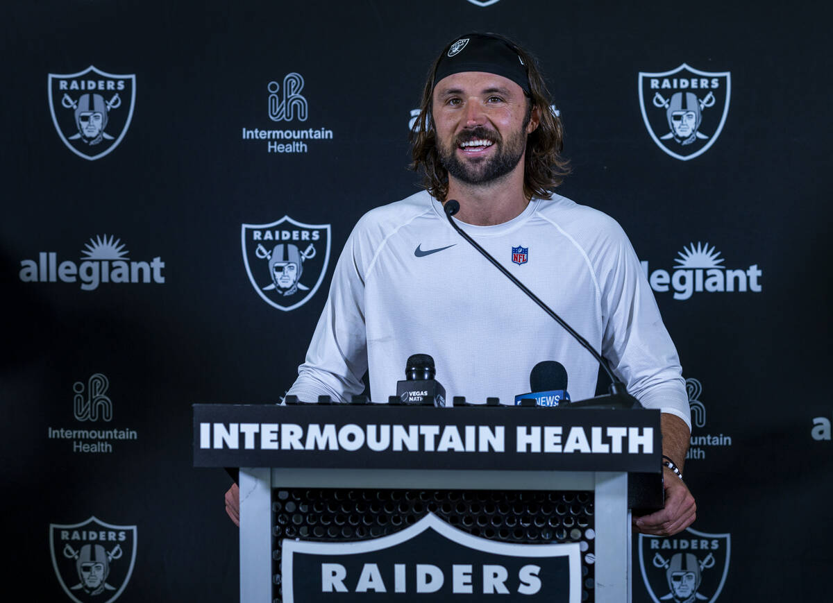 Raiders quarterback Gardner Minshew (15) listens to a question during a media interview on the ...