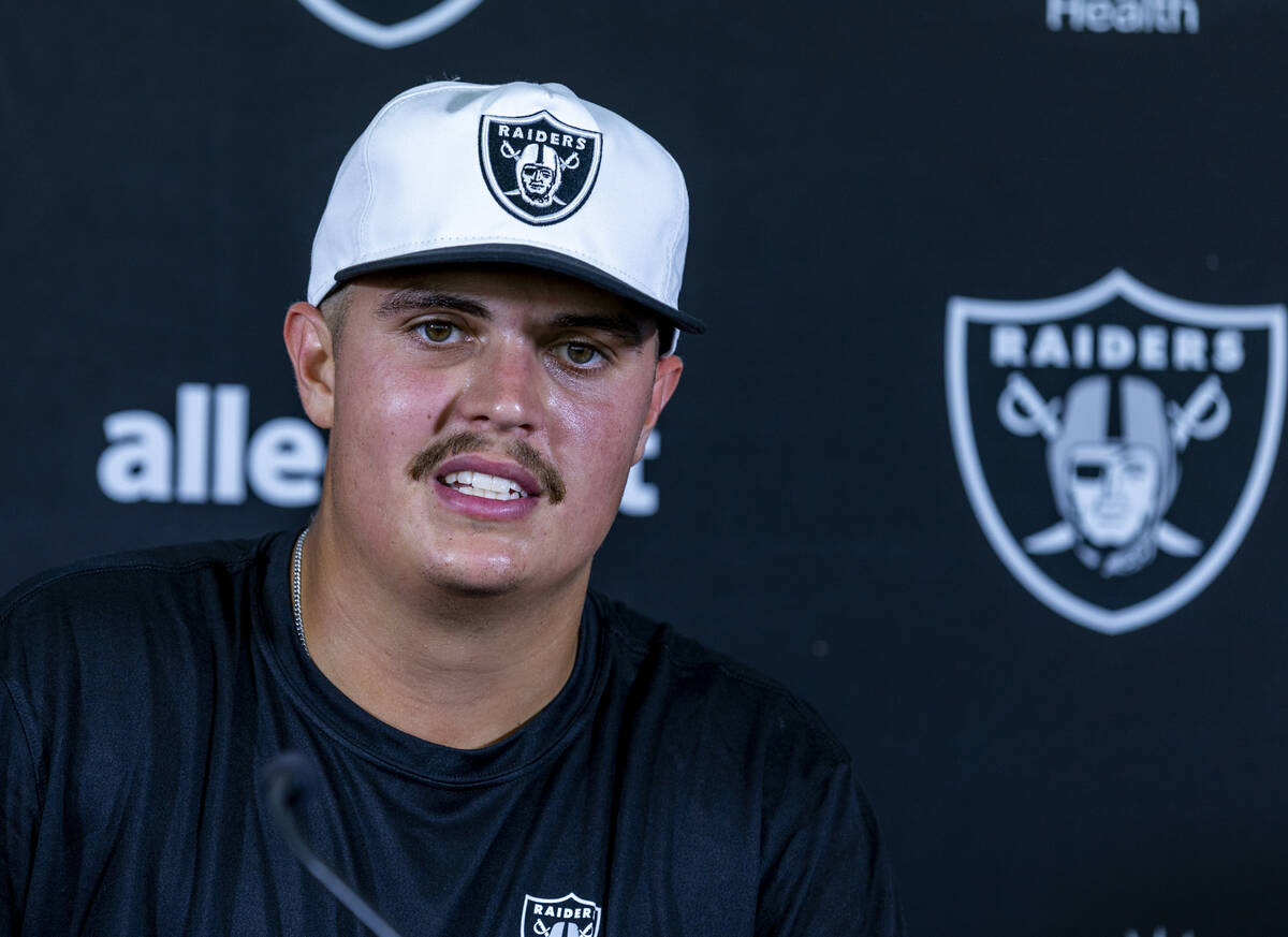 Raiders quarterback Aidan O'Connell listens to a question during a media interview on the first ...