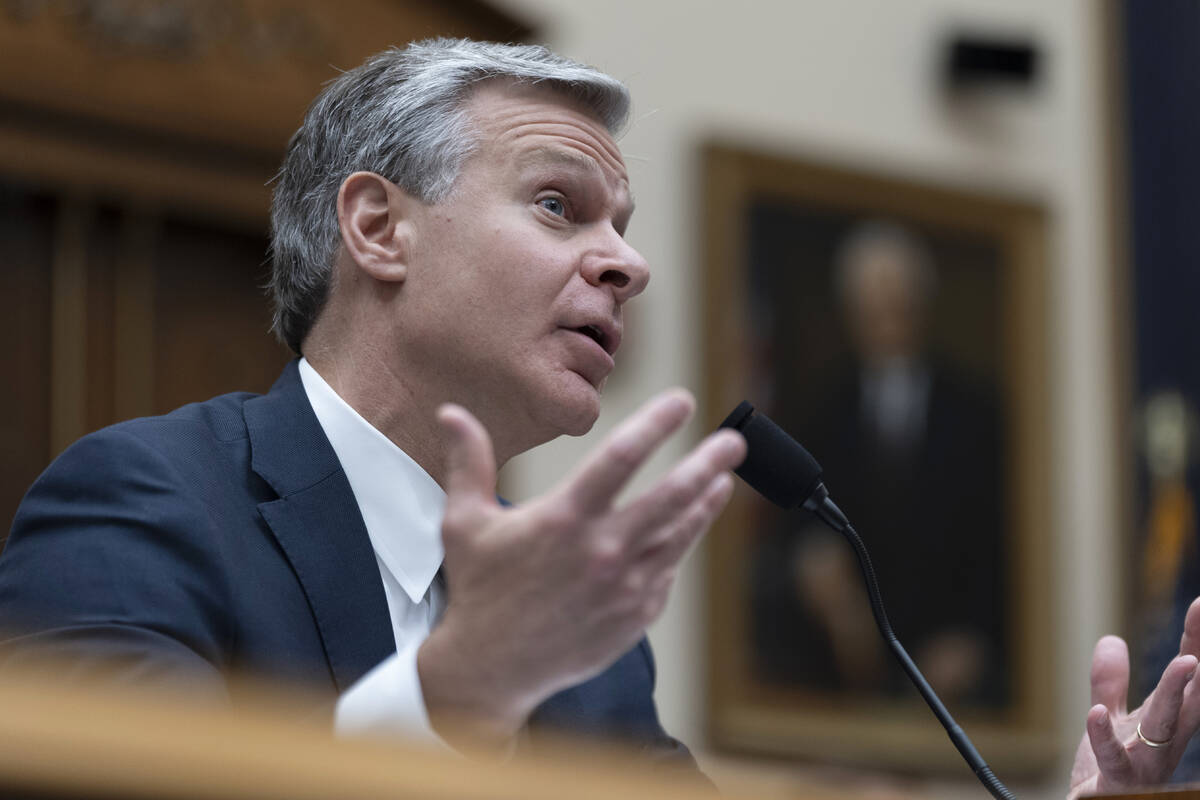 FBI Director Christopher Wray testifies before a House committee about the July 13 shooting at ...