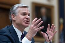 FBI Director Christopher Wray testifies before a House committee about the July 13 shooting at ...