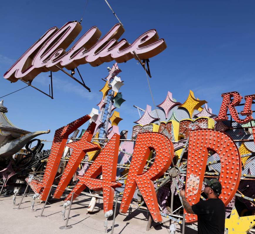 The sign from the Debbie Reynolds Hollywood Hotel is moved at the Neon Museum in Las Vegas Wedn ...