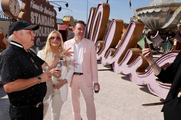 Todd Fisher, donor and son of Debbie Reynolds, his wife Catherine Fisher, and Neon Museum Execu ...