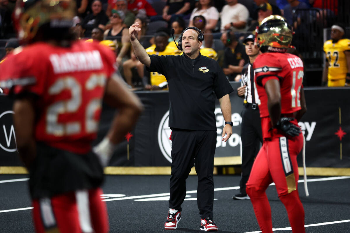 Vegas Knight Hawks head coach Mike Davis signals to his players during an IFL (Indoor Football ...