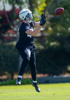 Raiders linebacker Robert Spillane (41) catches a pass while warming up during the second day o ...
