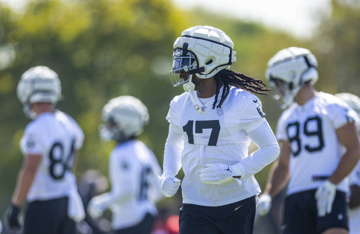 Raiders wide receiver Davante Adams (17) runs to the near side of the field during the second d ...