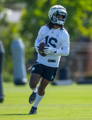 Raiders wide receiver Jakobi Meyers (16) catches a pass during the second day of Raiders traini ...