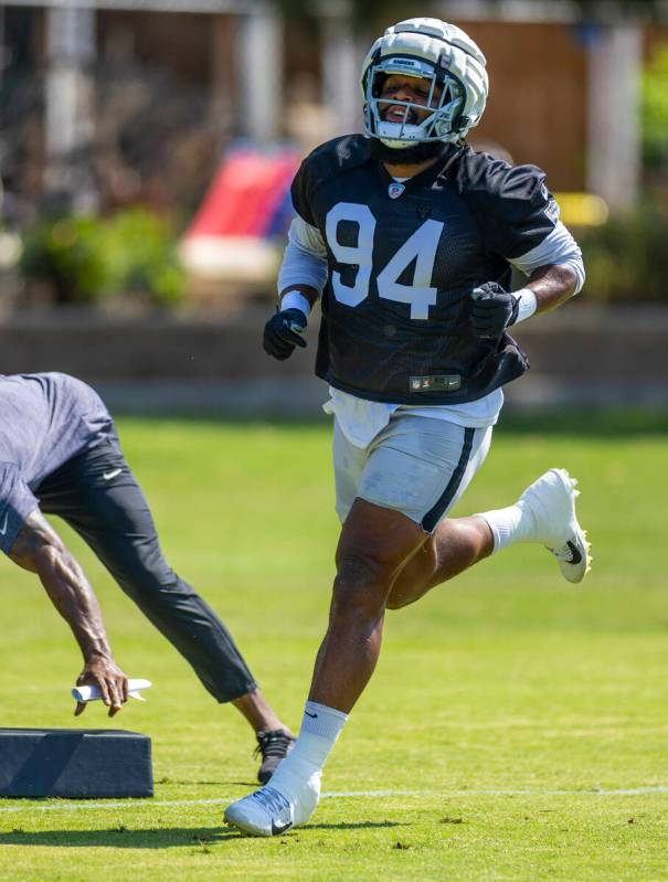 Raiders defensive tackle Christian Wilkins (94) runs on a drill during the second day of Raider ...