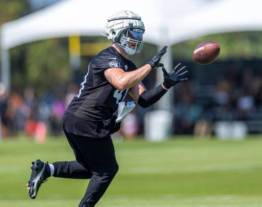 Raiders linebacker Robert Spillane (41) catches a pass during the second day of Raiders trainin ...