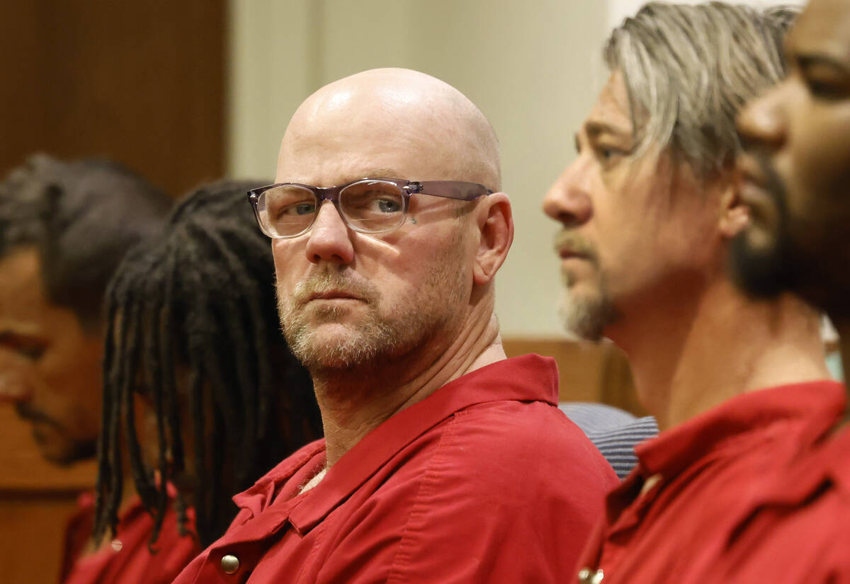 Ricky Lee Trader, center, a suspect in connection with a cold-case homicide that occurred in 20 ...