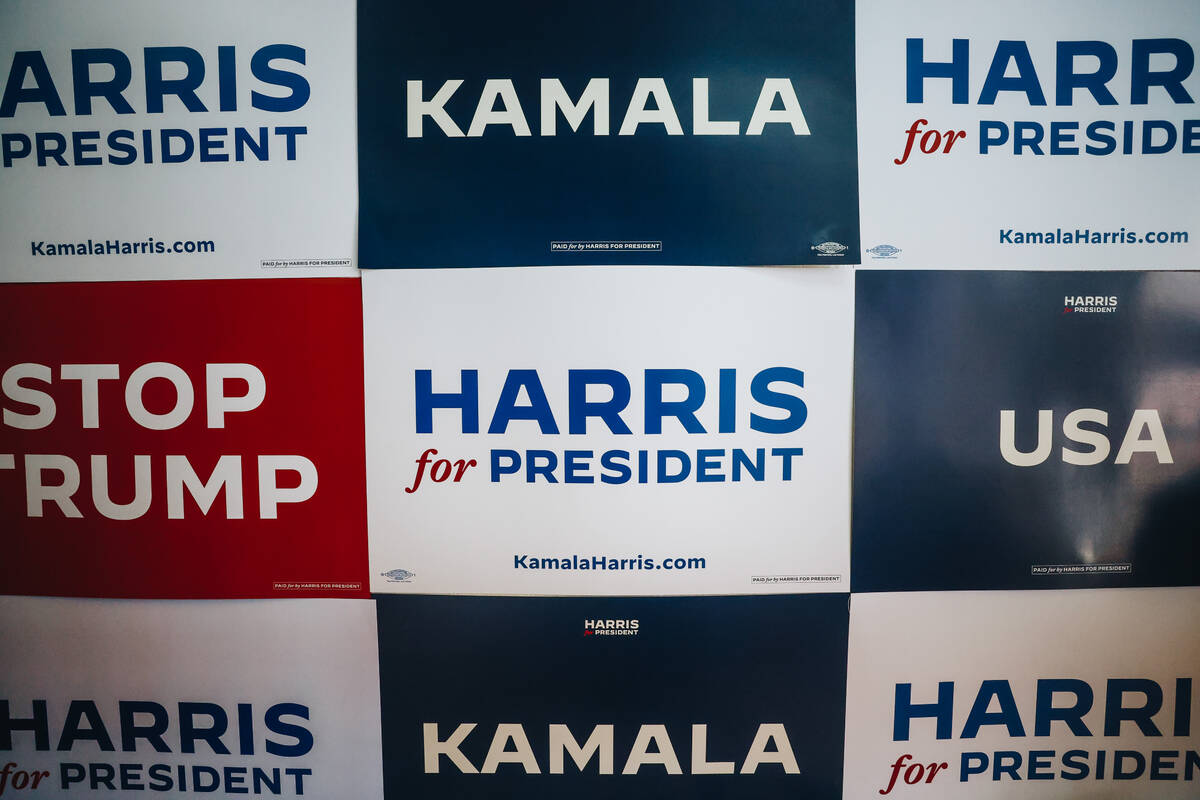 Campaign signs line the walls during an event to officially launch Vice president Kamala Harris ...