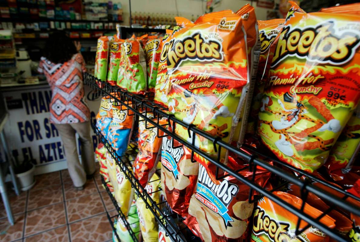 Flamin' Hot Cheetos are pictured near the front door of La Azteca Market in South Los Angeles, ...