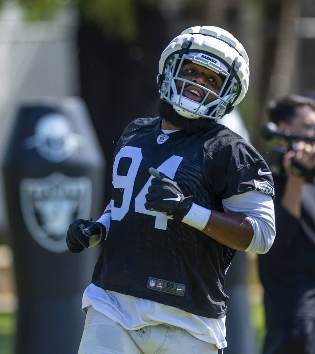 Raiders defensive tackle Christian Wilkins (94) runs on a drill during the second day of Raider ...