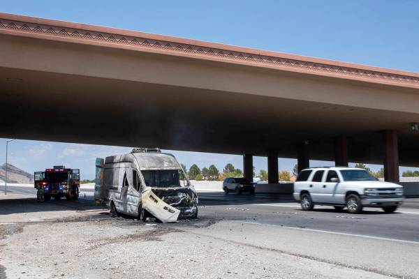 The charred remains of a Freed’s Bakery delivery truck sits after Las Vegas Fire & R ...