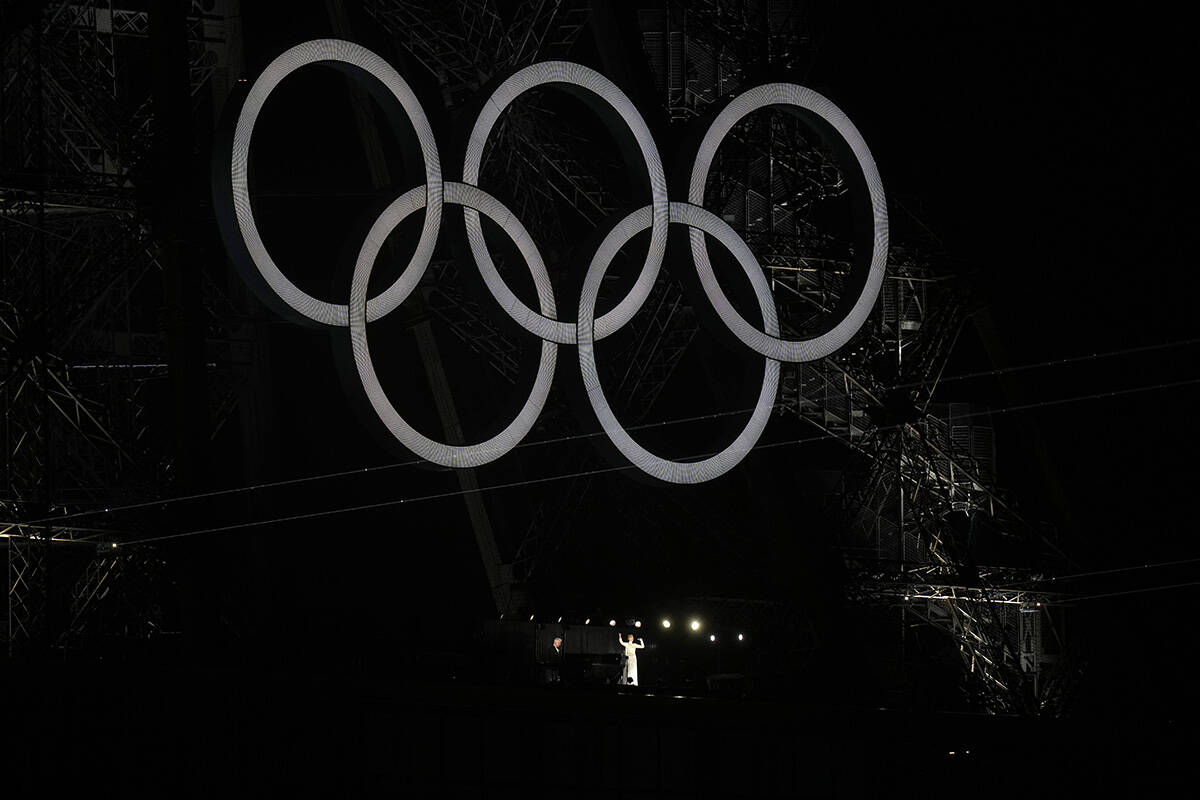 Celine Dion performs from the Eiffel Tower during the opening ceremony of the 2024 Summer Olymp ...