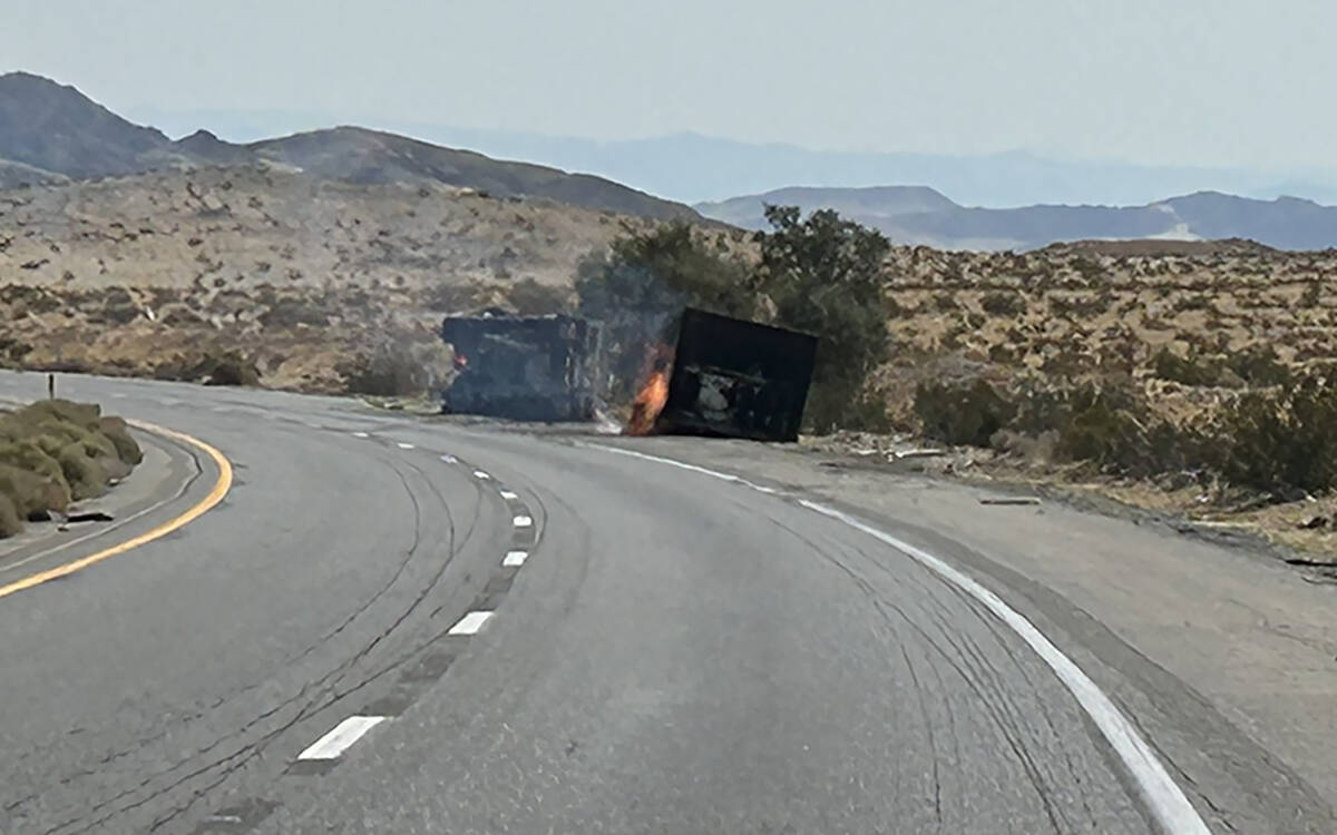 A truck carrying lithium ion batteries burns along Interstate 15 near Barstow, California, on F ...