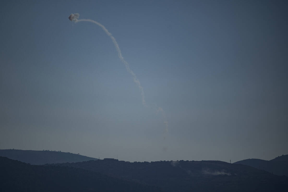 Israeli Iron Dome air defense system fires to intercept an attack from Lebanon over the Galilee ...