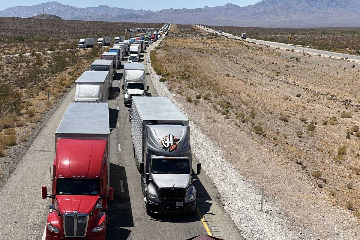 Trucks and vehicles are backed up on Interstate 40 at Essex Road on Saturday, July 27, 2024. (S ...