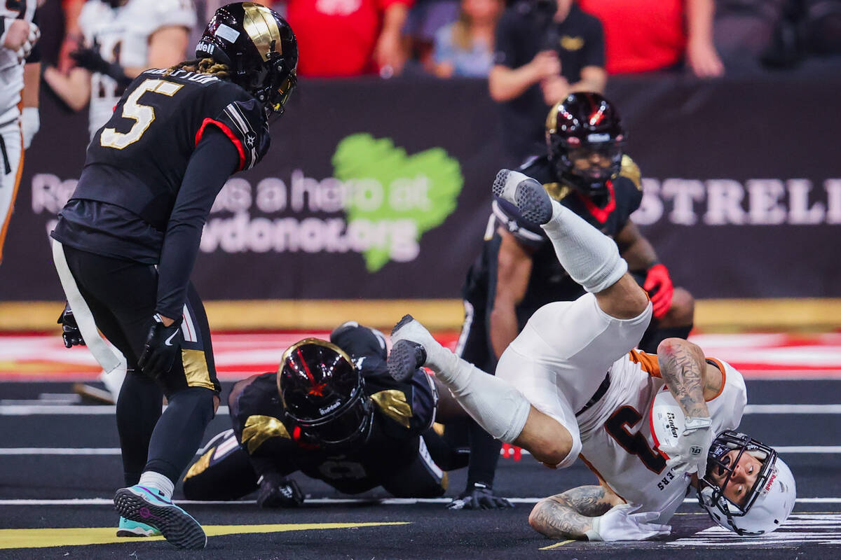 Rattlers running back Shannon Brooks (3) rolls over after running the ball during a playoff gam ...