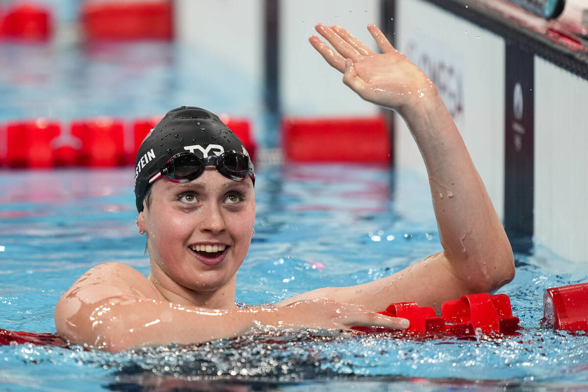 Claire Weinstein, of the United States, reacts after competing in the women's 200-meter freesty ...