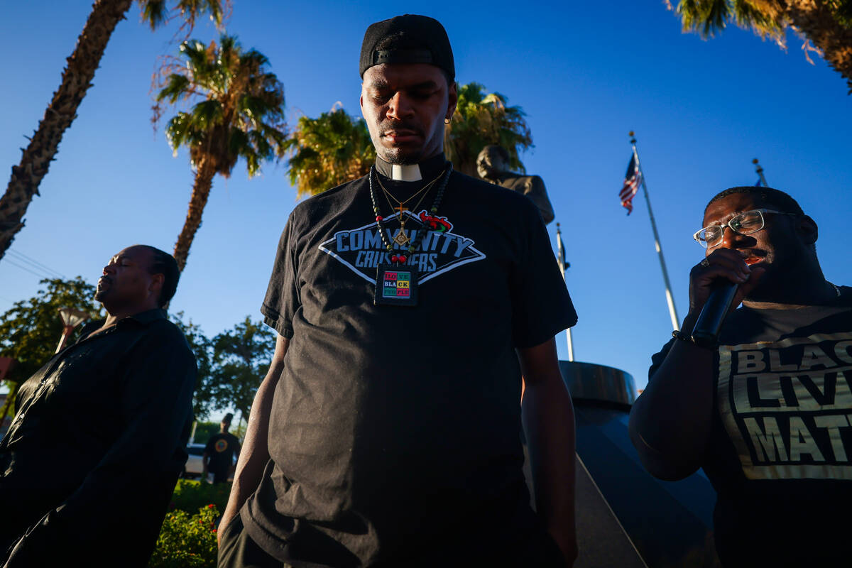 Stretch Sanders bows his head during a vigil for Sonya Massey, a Black woman who was killed in ...