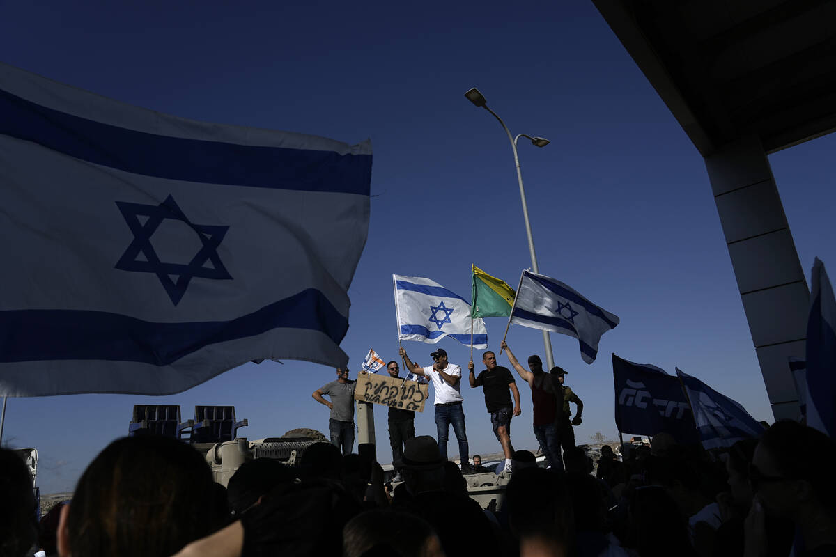 Protesters gather in support of soldiers being questioned for detainee abuse, outside of the Sd ...