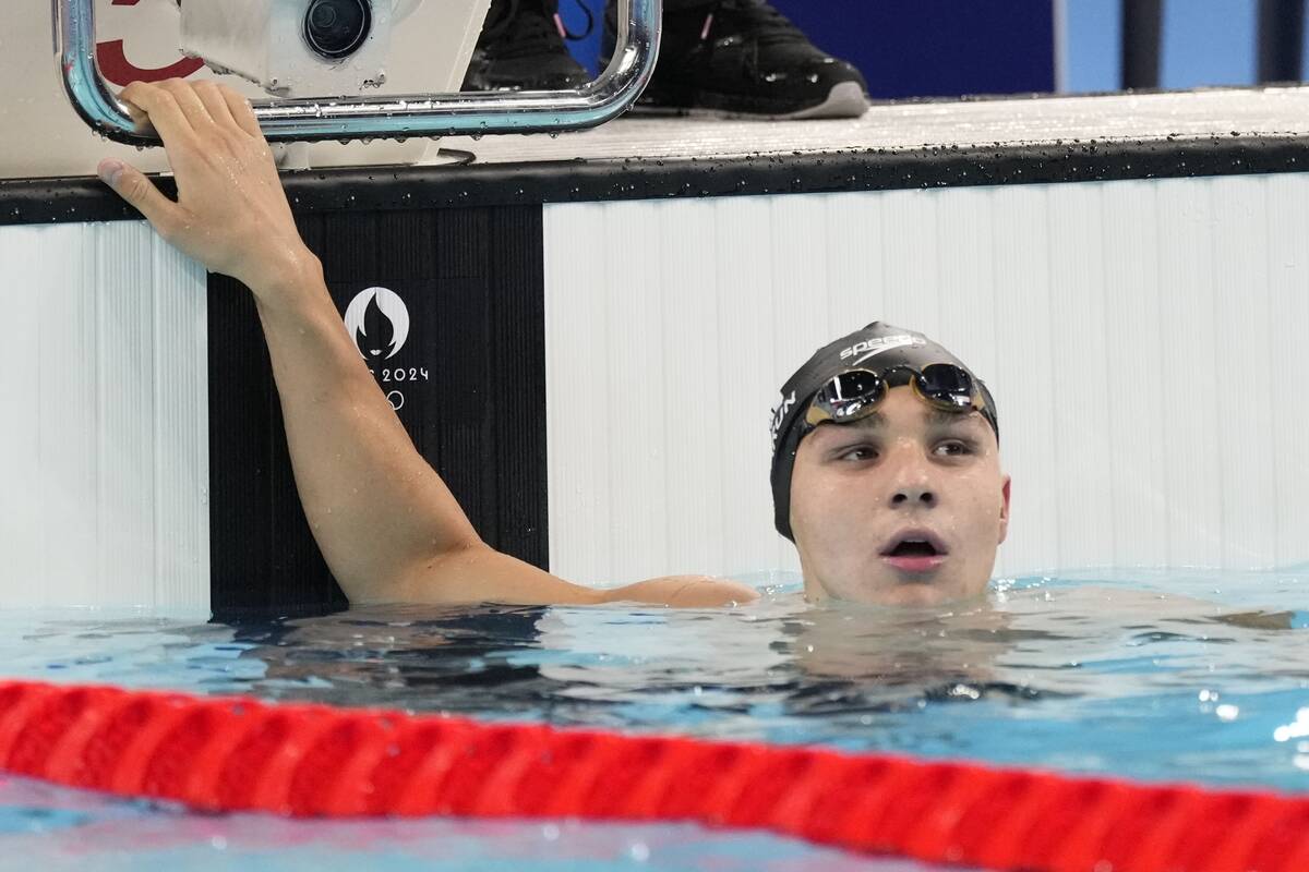 Ilya Kharun, of Canada, competes during a heat in the men's 200-meter butterfly at the 2024 Sum ...