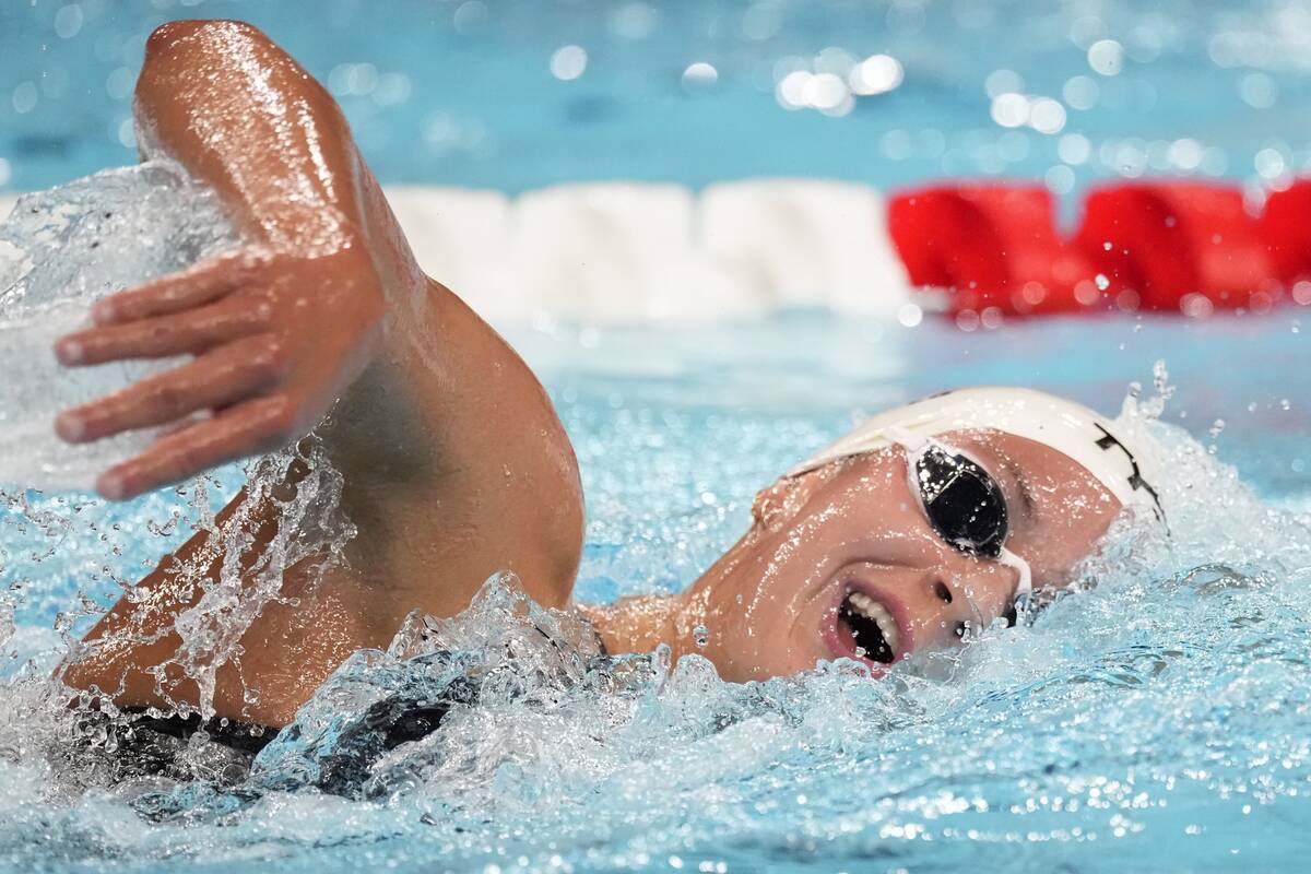 Katie Grimes, of the United States, competes during a heat in the women's 1500-meter freestyle ...