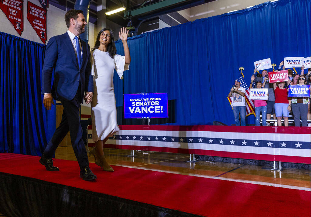 Ohio Senator JD Vance and his wife Usha arrive on stage for him to deliver remarks during a ral ...