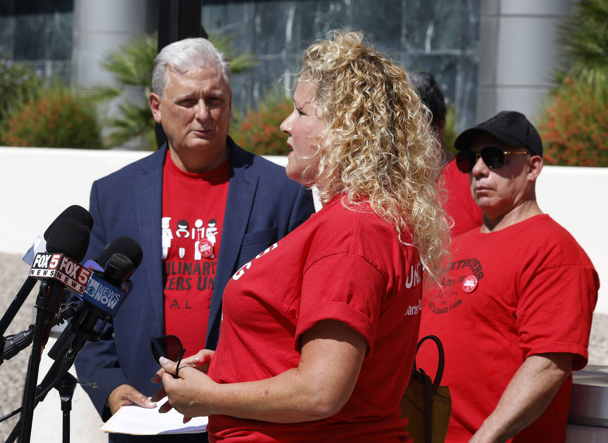 Jennifer Hanson, a banquets at Red Rock Resorts, speaks during the press conference as Ted Papp ...