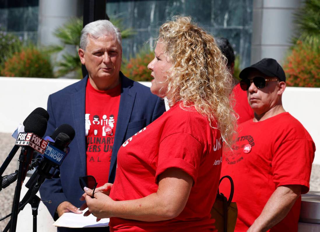 Jennifer Hanson, a banquets at Red Rock Resorts, speaks during the press conference as Ted Papp ...