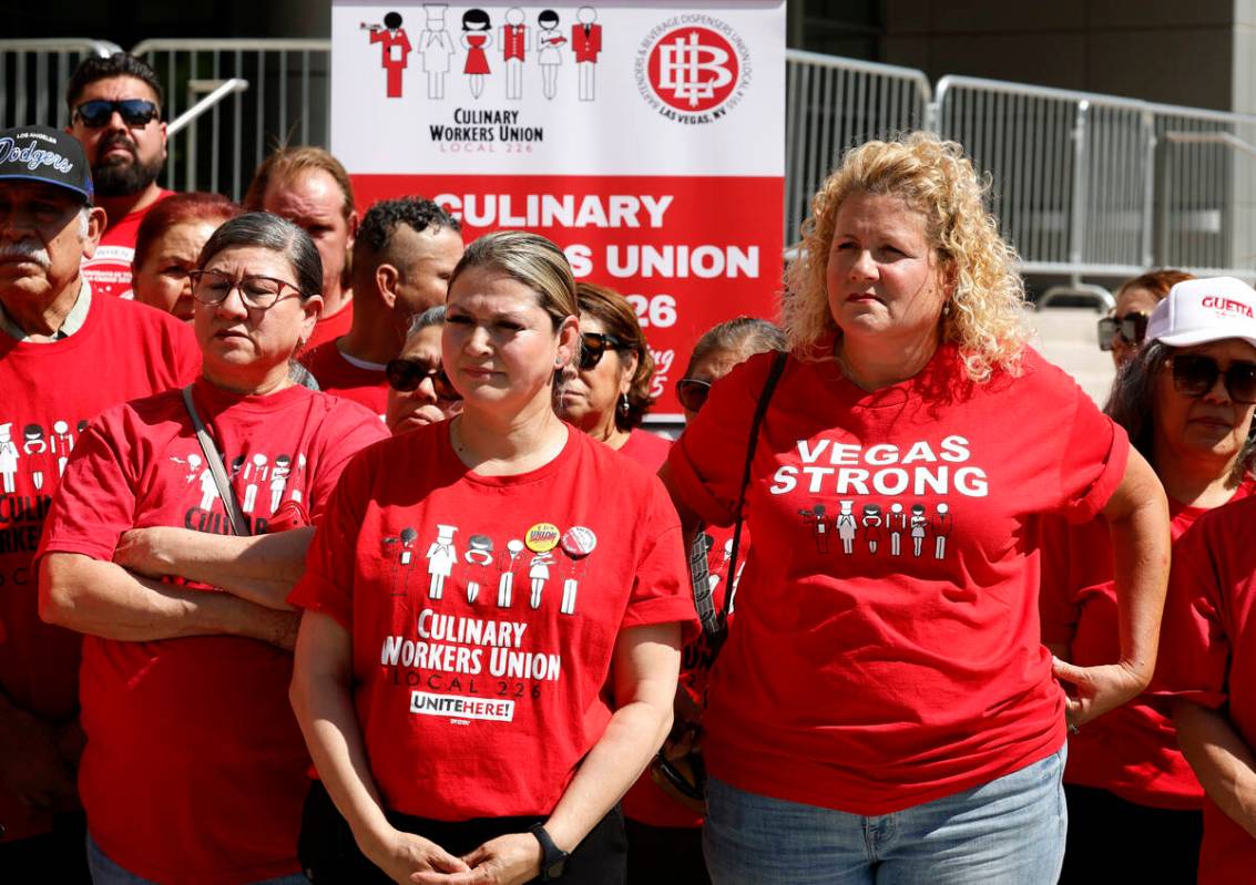 Workers, including Alba Acosta, center, and Jennifer Hanson, right, both banquets at Red Rock R ...