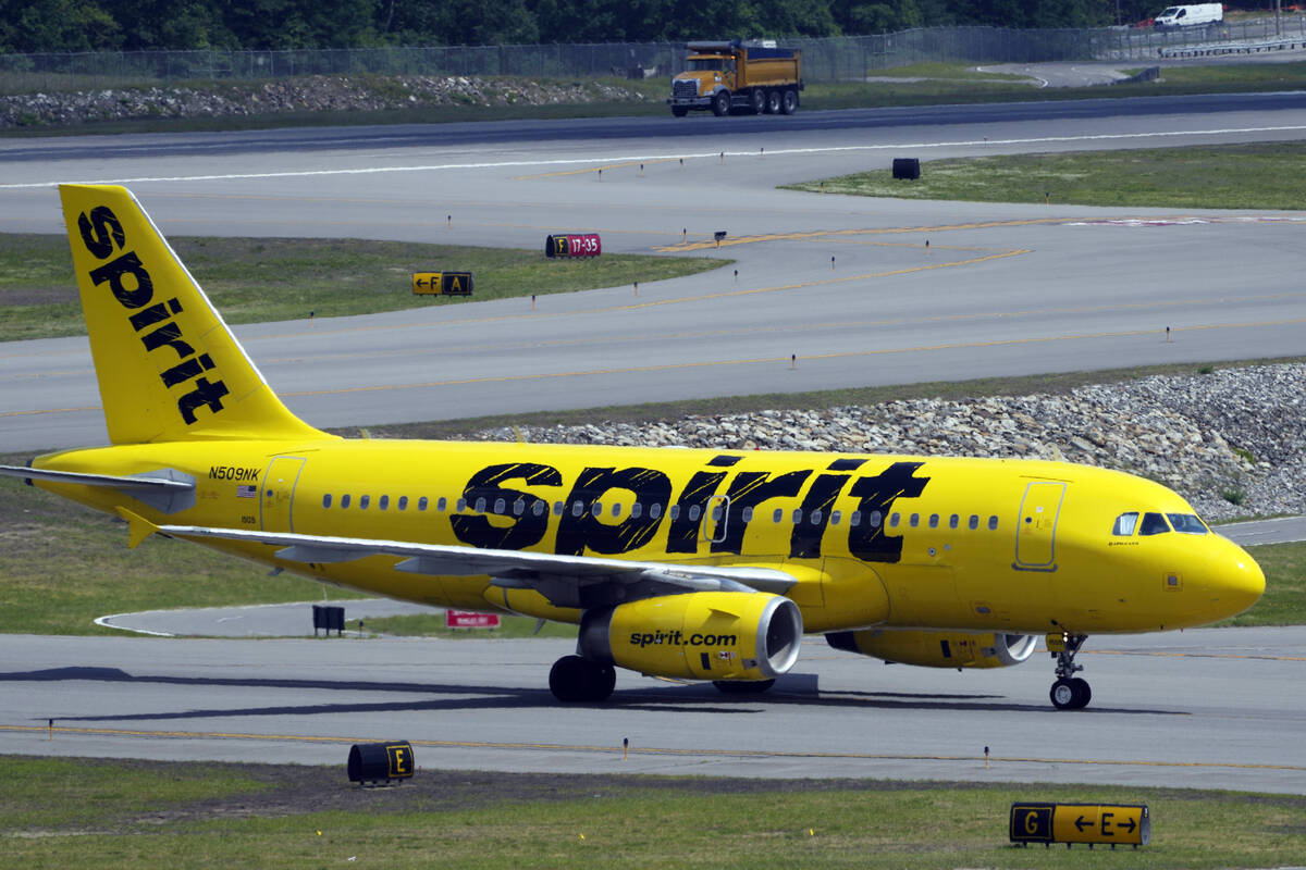 A Spirit Airlines 319 Airbus taxis at Manchester Boston Regional Airport, Friday, June 2, 2023, ...