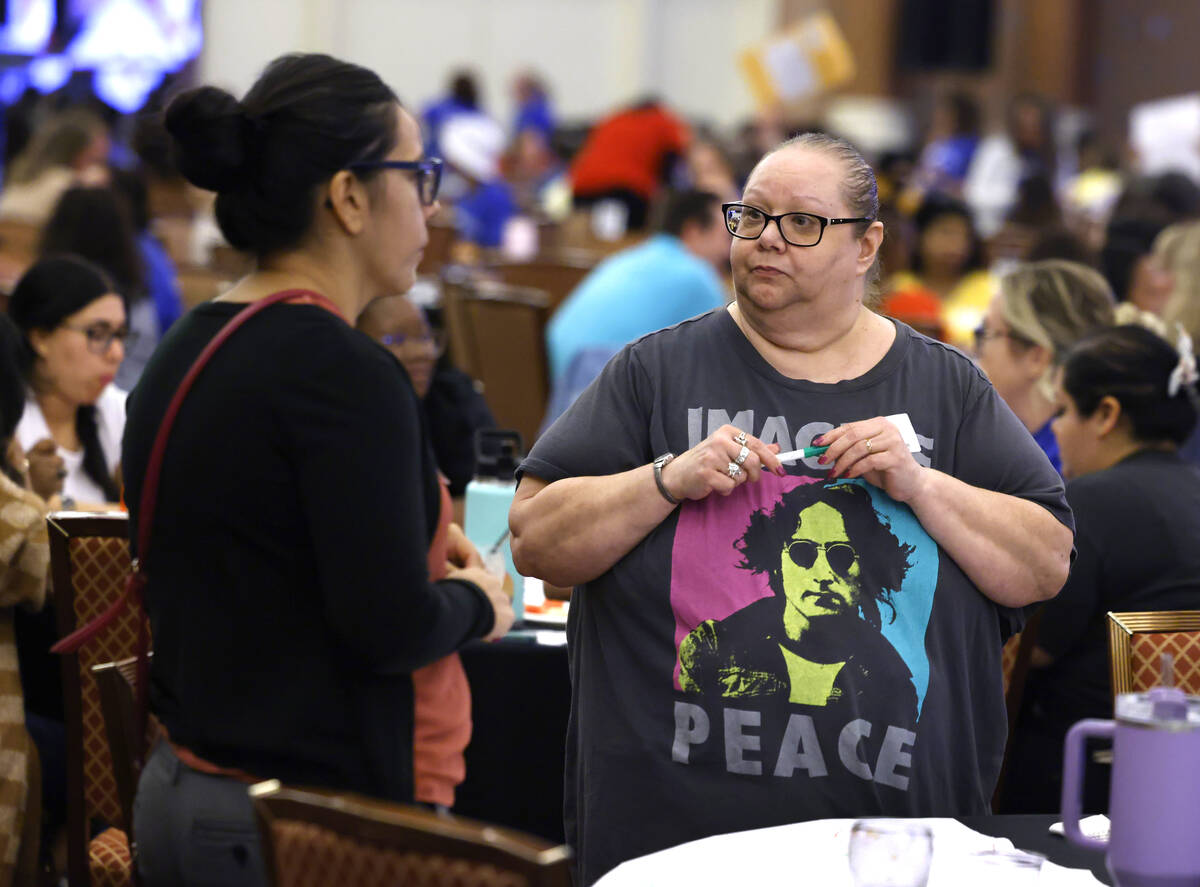 Brenda Hernandez, left, of Threat and Crises Response, and Cheryl Kent, of Ruby Thomas Elementa ...