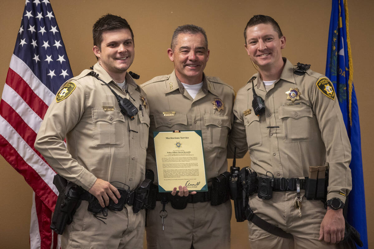 Officer Matthew Nardone, left, Undersheriff Andrew Walsh, center, and Officer Derek Reynolds, r ...