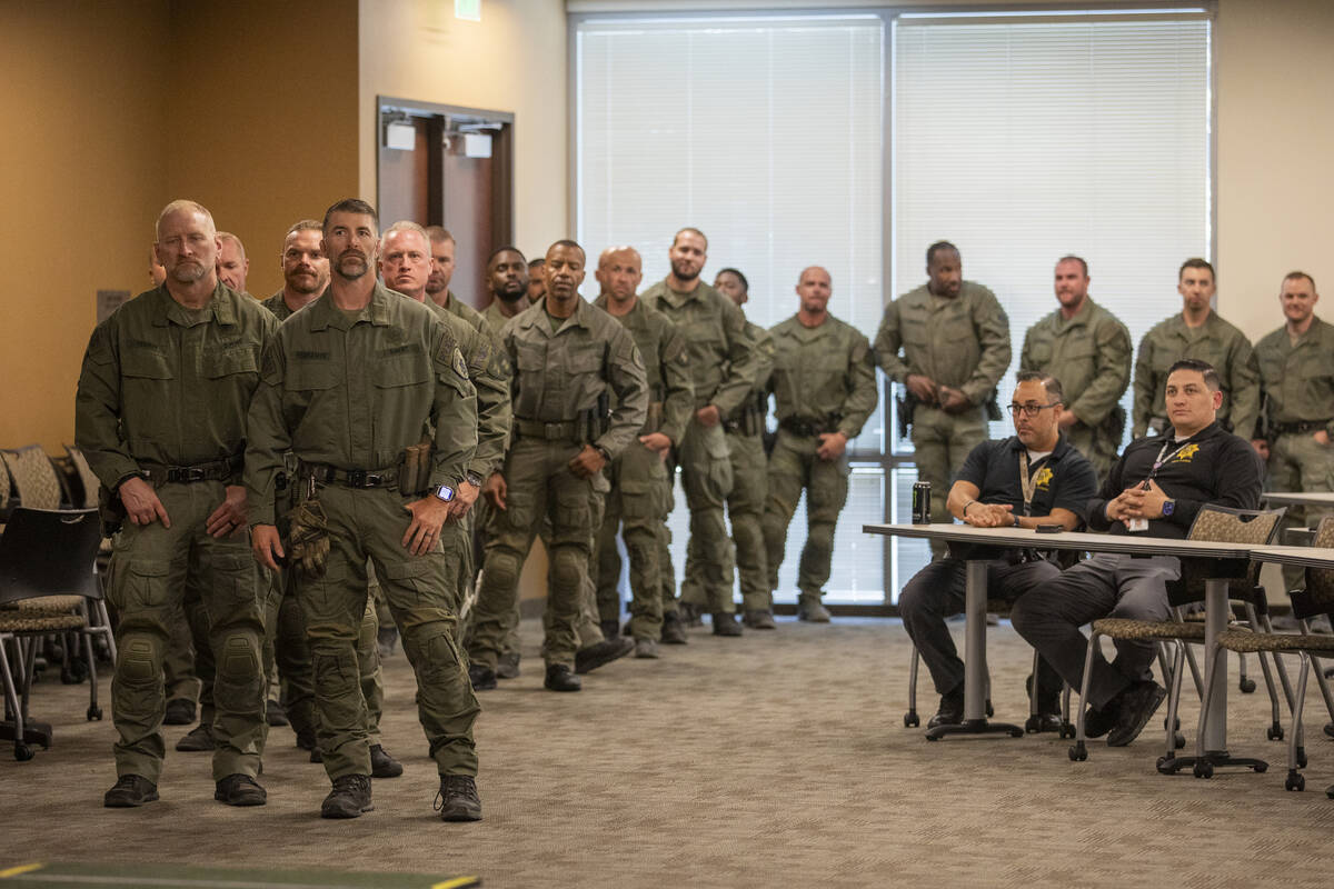 Metropolitan Police Department SWAT officers wait to receive the Community Service award during ...