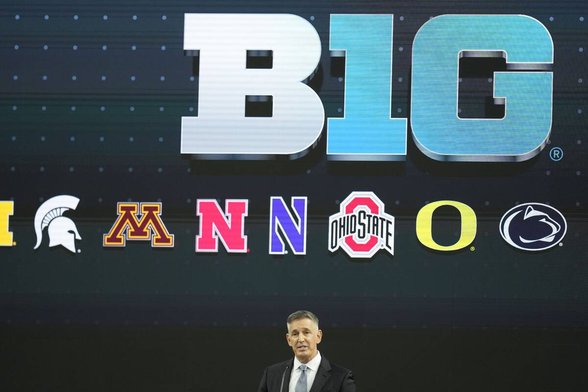 Big Ten Commissioner Tony Petitti speaks during an NCAA college football news conference at the ...