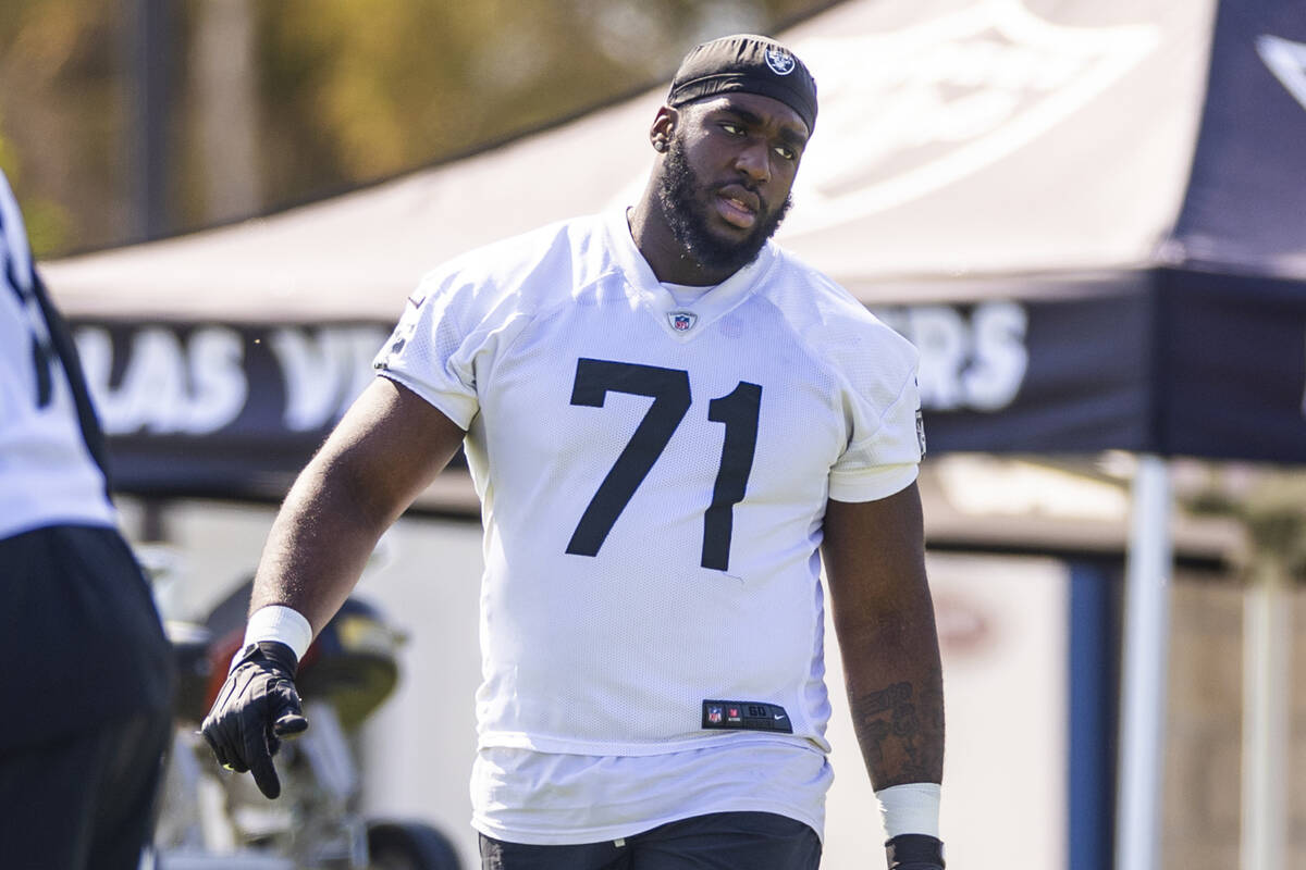 Raiders offensive tackle DJ Glaze (71) takes the field during the second day of Raiders trainin ...