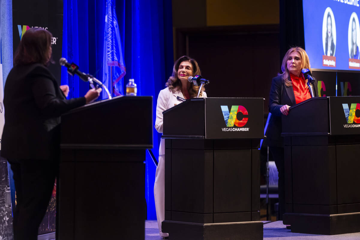 Former U.S. Rep. Shelley Berkley, center, and Councilwoman Victoria Seaman, right, candidates f ...