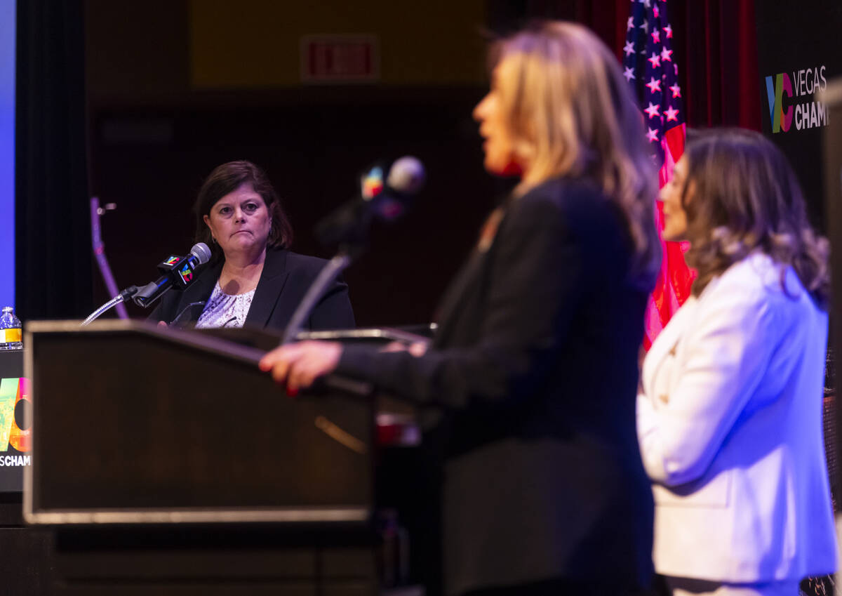 Debate moderator Betsy Fretwell, former manager of the City of Las Vegas, listens to mayoral ca ...