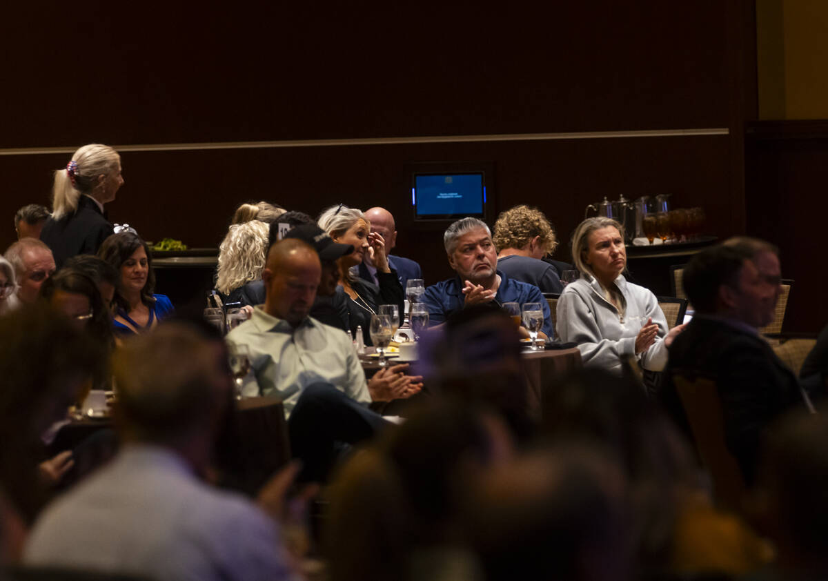 People listen to Councilwoman Victoria Seaman and U.S. Rep. Shelley Berkley, not pictured, can ...