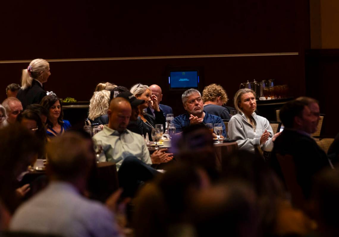 People listen to Councilwoman Victoria Seaman and U.S. Rep. Shelley Berkley, not pictured, can ...