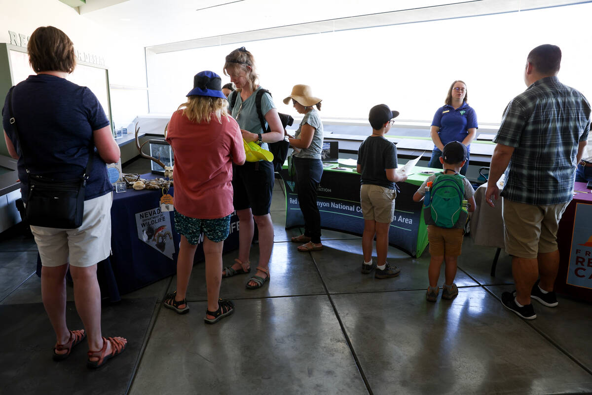 People check out informational booths during an event for World Ranger Day at Red Rock Canyon V ...