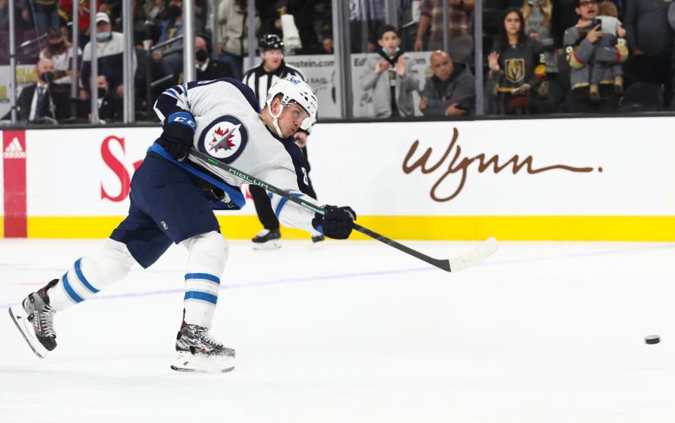 Winnipeg Jets defenseman Nate Schmidt (88) shoots the puck against the Golden Knights during ov ...