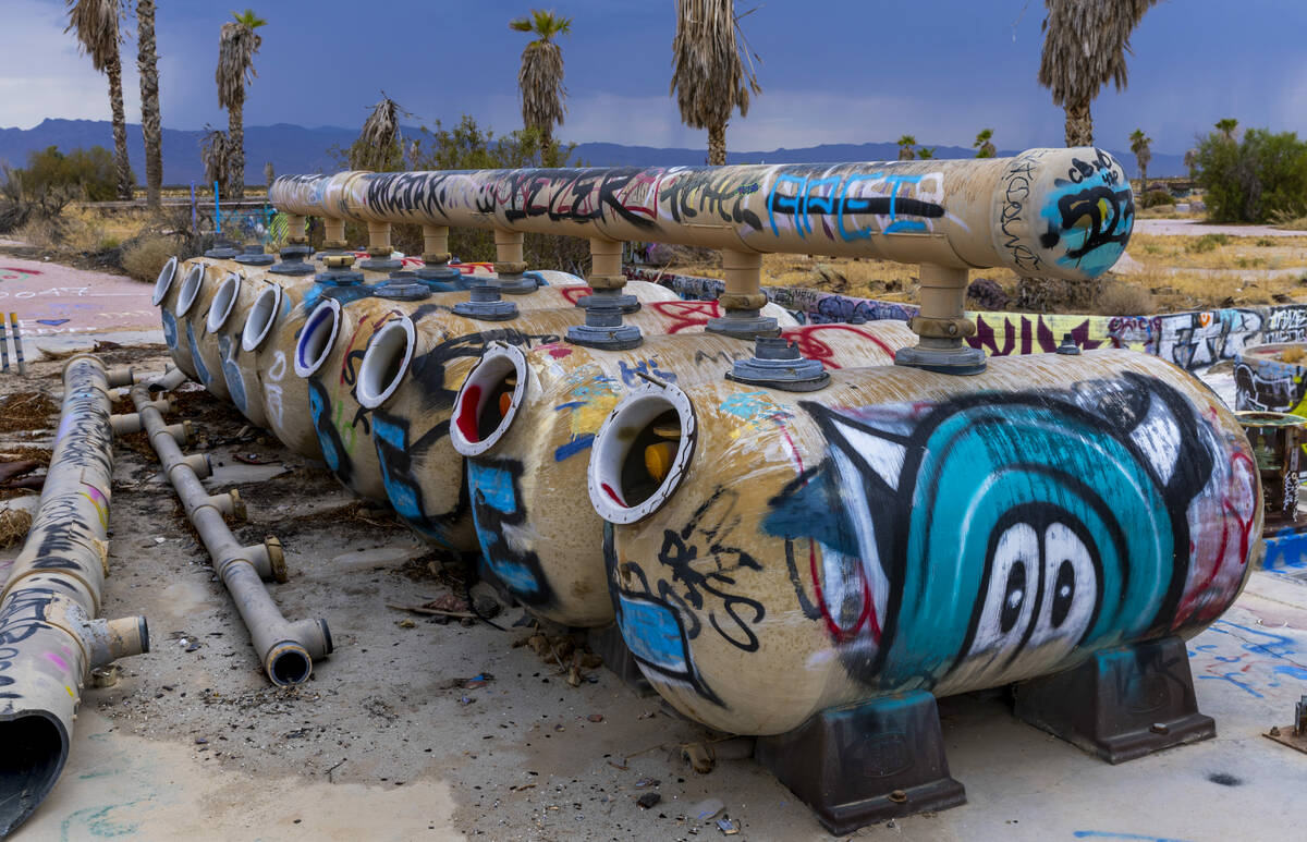 Tanks are covered in graffiti at the former Rock-A-Hoola Water Park on Tuesday, July 23, 2024, ...