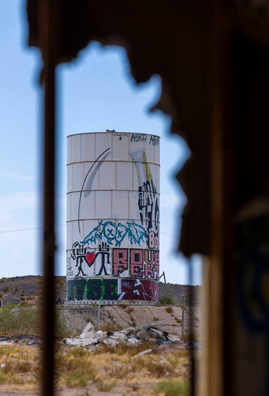 A water tower is covered in graffiti at the former Rock-A-Hoola Water Park on Tuesday, July 23, ...