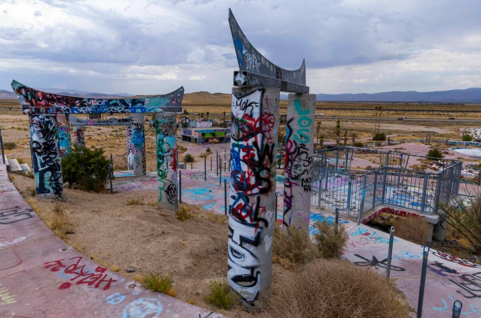 A water slide hill is dismantled and covered in graffiti at the former Rock-A-Hoola Water Park ...