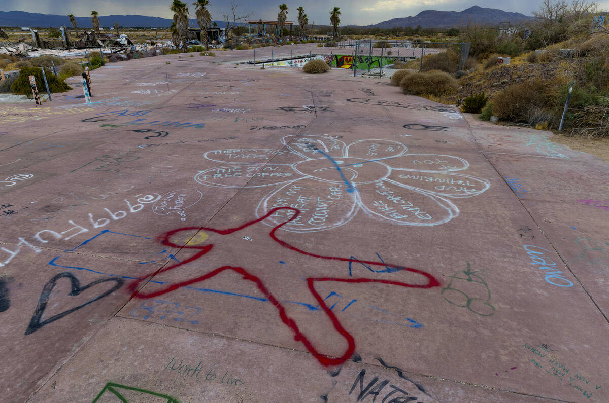 Graffiti covers the ground and most of the remaining structures at the former Rock-A-Hoola Wate ...