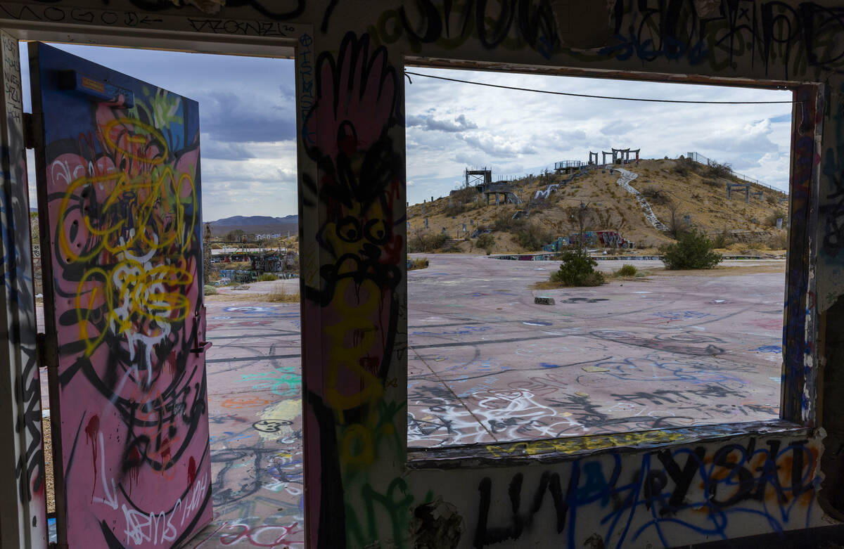 Graffiti covers most of the remaining structures and ground at the former Rock-A-Hoola Water Pa ...